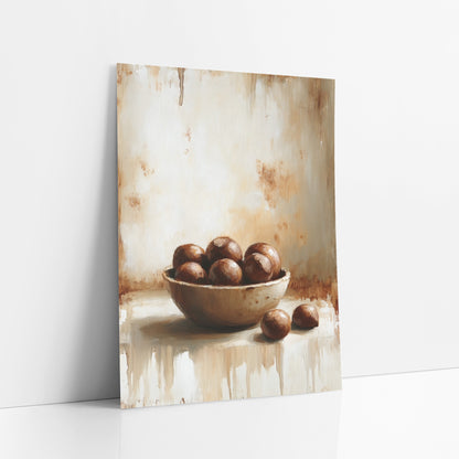 Two Chestnuts Dripping Farmhouse art print leaning against a white wall – still life of a shallow bowl of glossy brown