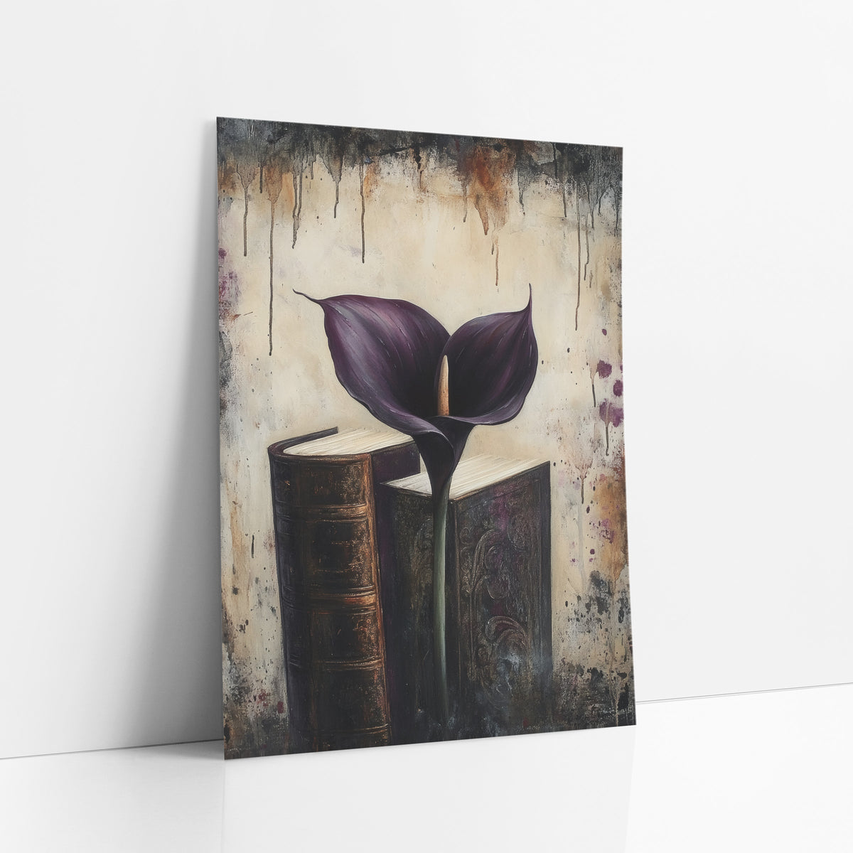 Dark Plum Calla Lily Books art print leaning against a white wall – dark purple calla lily standing between two old leather