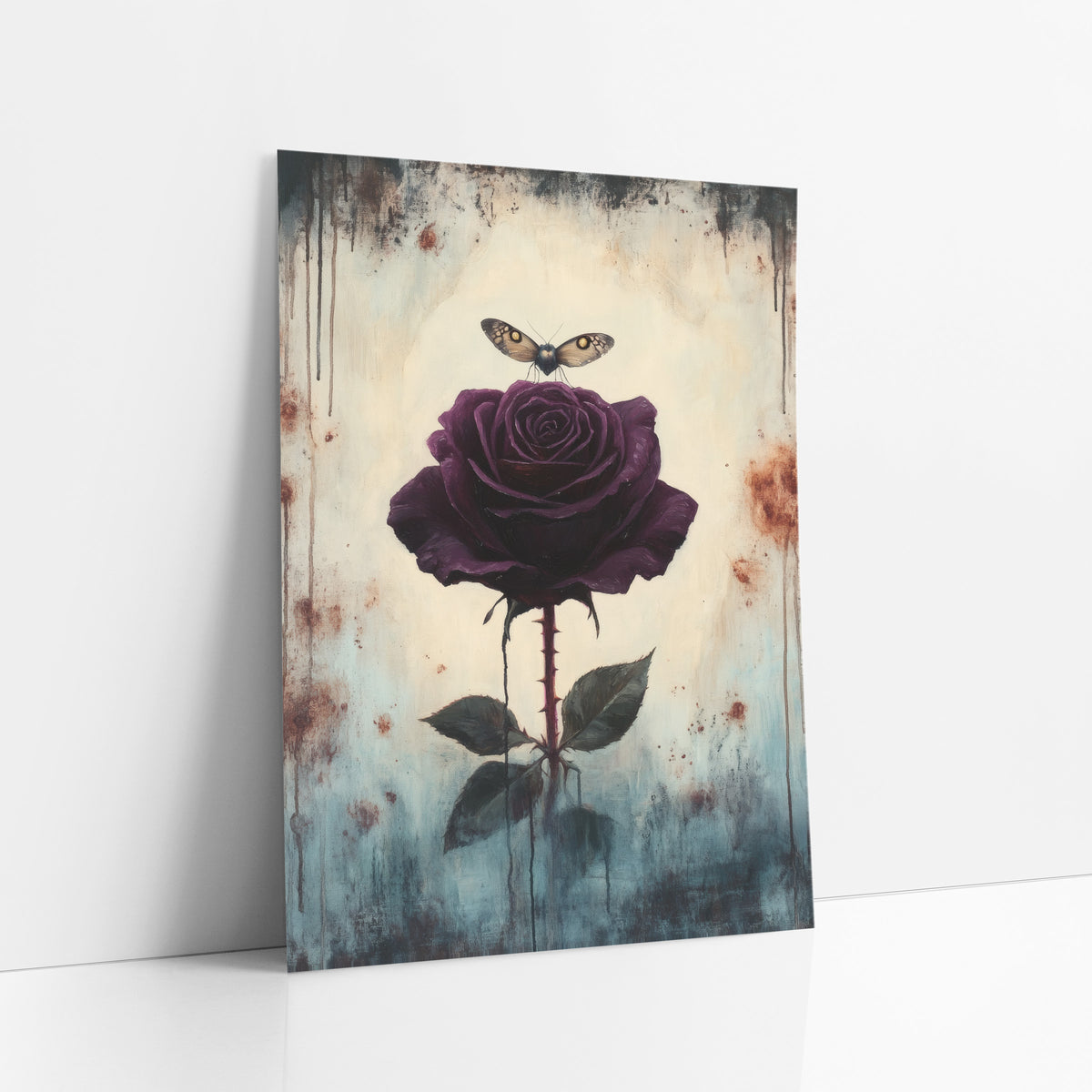 Hovering Moth Plum Rose Gothic art print leaning against a white wall – dark plum rose on a thorny stem with a small moth