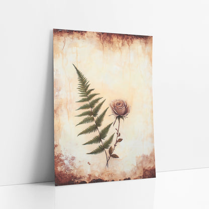 Ivory Fern Dusty Rose Vintage art print leaning against a white wall – green fern frond beside a dusty pink rose on a cream