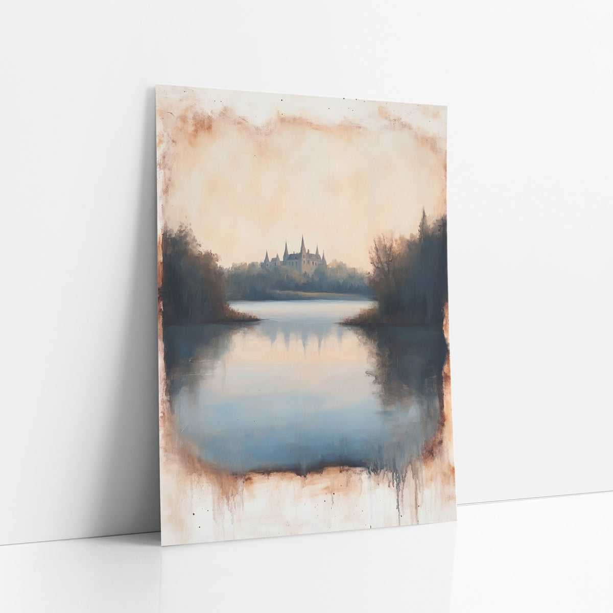 Misty Castle Lake Landscape Vintage art print leaning against a white wall – castle with pointed towers across a still blue