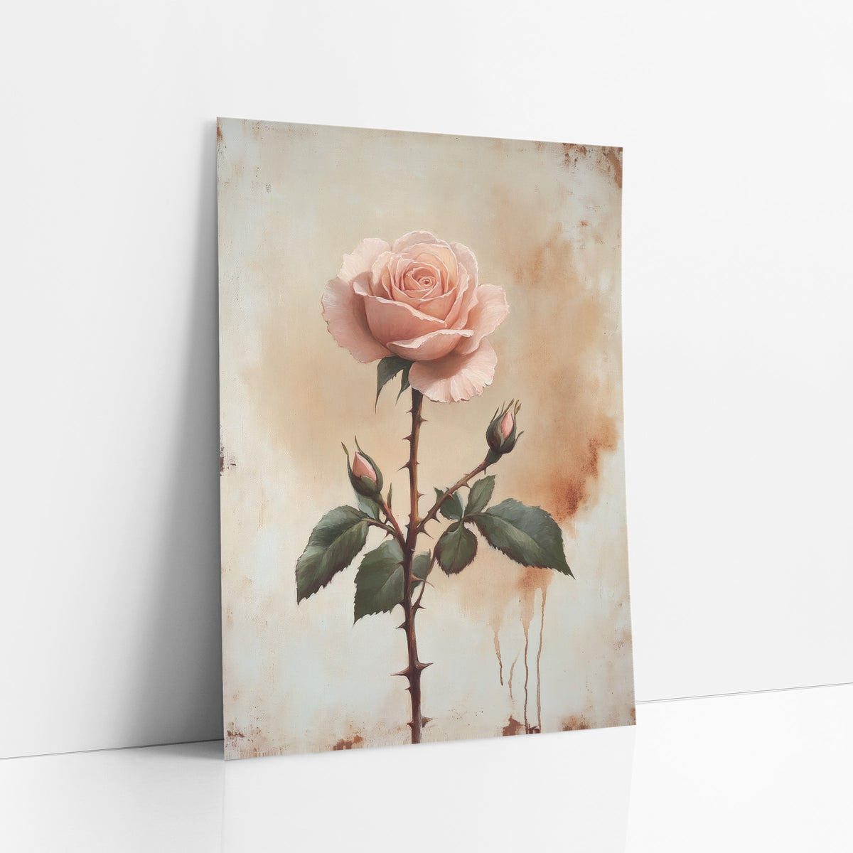 Blush Rose Thorned Stem Botanical art print leaning against a white wall – single blush pink rose with two buds on a thorny