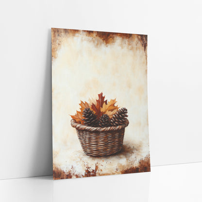 Pinecone Oak Leaf Basket Rustic art print leaning against a white wall – wicker basket holding three pinecones and red