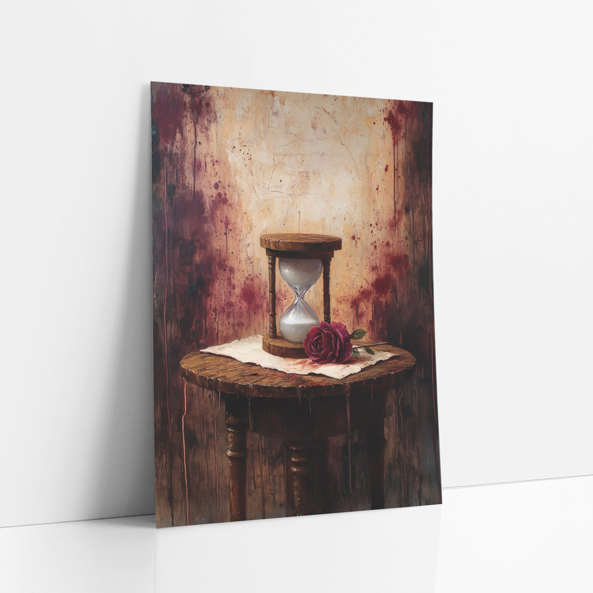 Spindle Table Hourglass Splatter Gothic art print leaning against a white wall – wooden hourglass with white sand