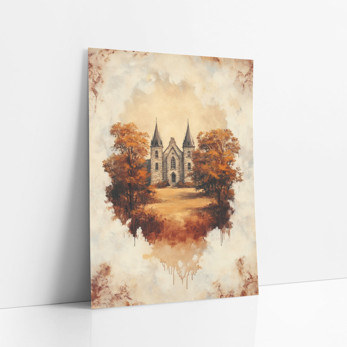 Autumn Gothic Stone Building Vintage art print leaning against a white wall – gothic stone building with two pointed towers