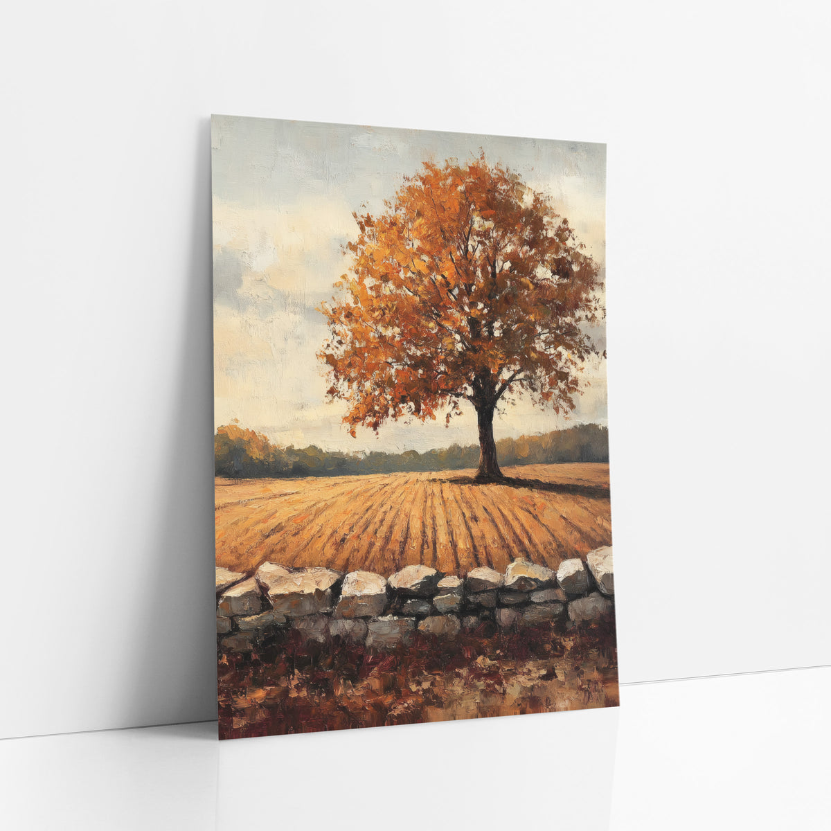 Orange Maple Furrowed Field Farmhouse art print leaning against a white wall – lone tree with orange autumn leaves above