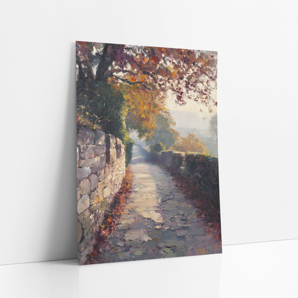 Misty Autumn Stone Path Landscape art print leaning against a white wall – autumn landscape of a paved path between a stone