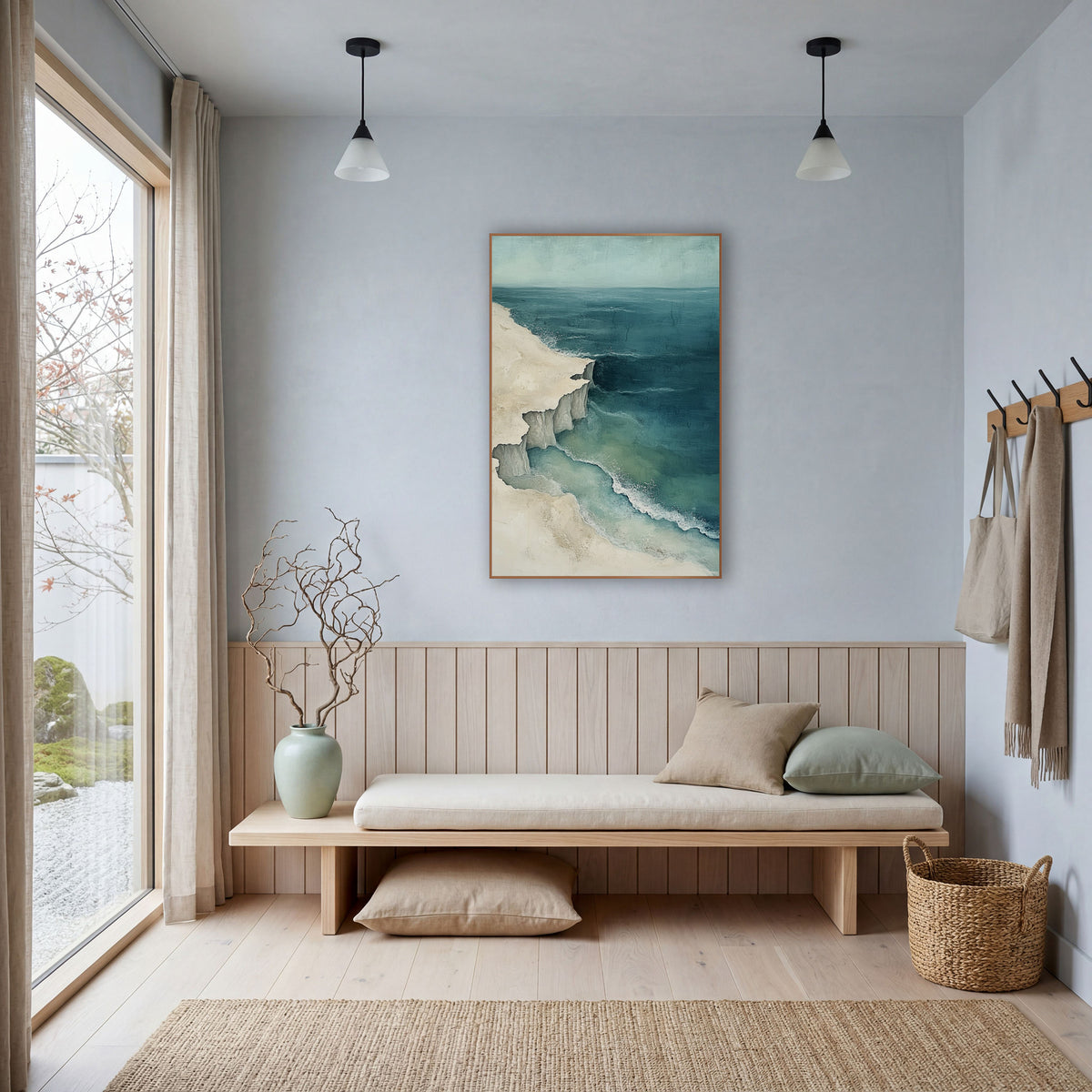 Aerial Coastline Cliffs Teal Coastal wall art in a bright coastal-style room – aerial coastal artwork of a cream shore