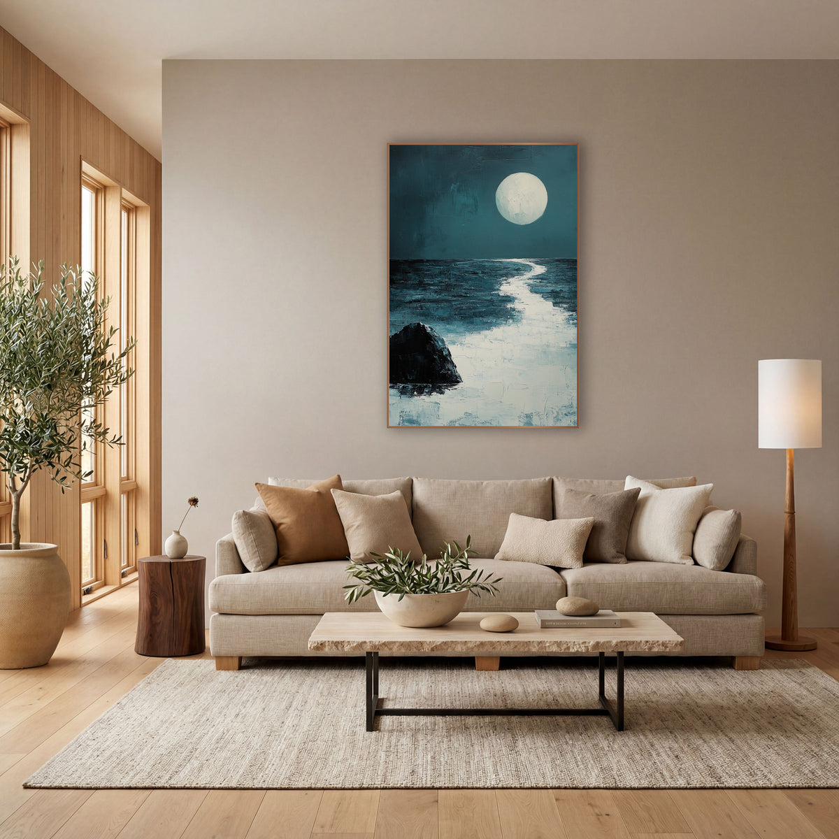 Moonlit Sea Rock Coastal Abstract wall art in a bright coastal-style room – large pale full moon over a calm dark teal