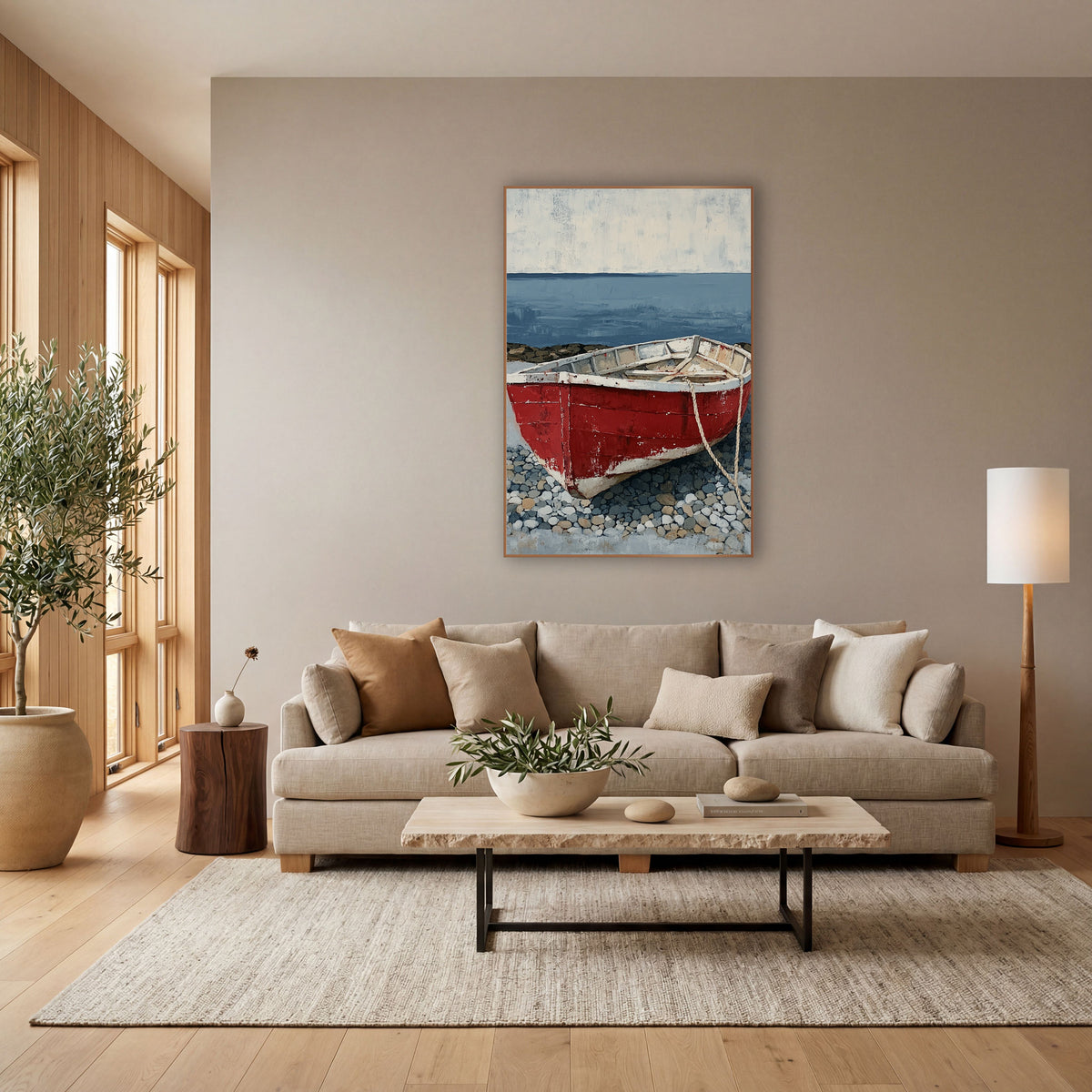 Red Rowboat Pebble Shore Coastal wall art in a bright coastal-style room – weathered red rowboat with a white rim