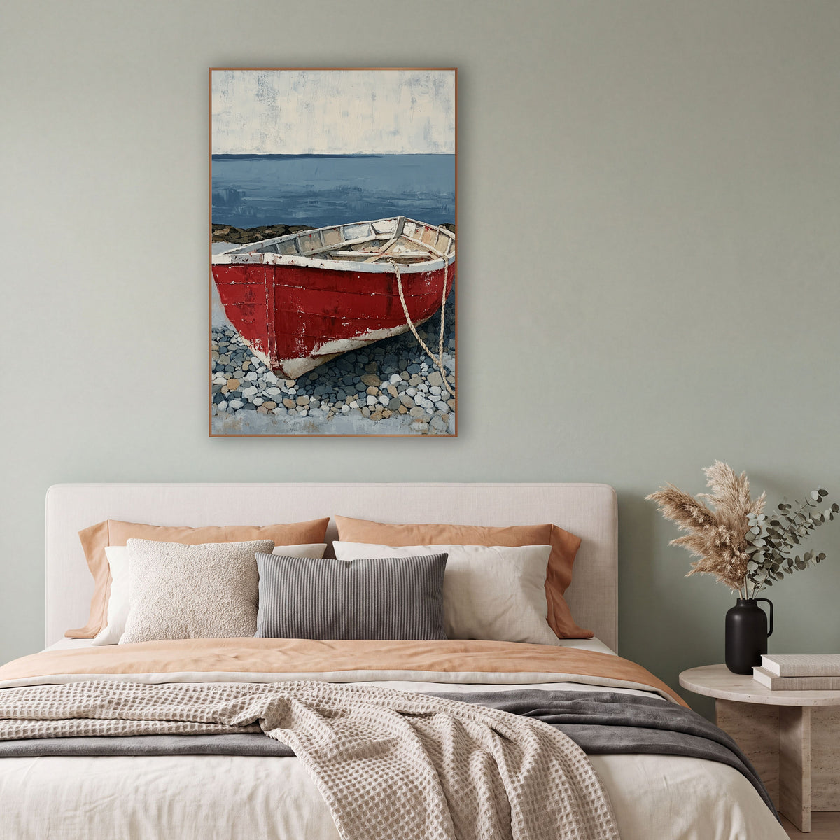 Red Rowboat Pebble Shore Coastal wall art in a bright coastal-style room – weathered red rowboat with a white rim