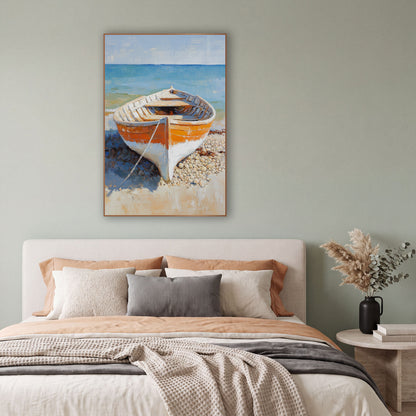 Pebble Beach Dory Coastal Scene wall art in a bright coastal-style room – orange and white wooden rowboat on a pebble