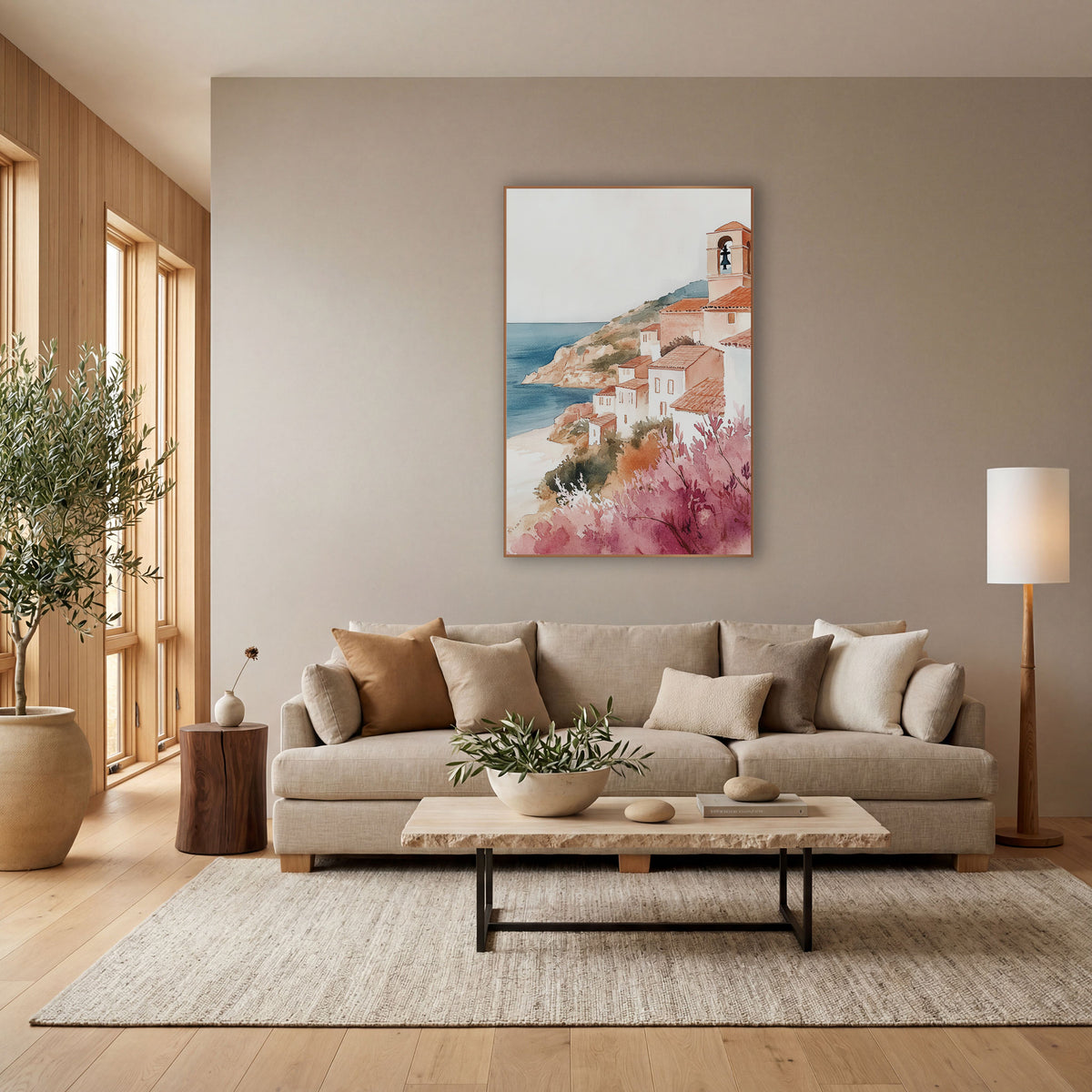 Pink Blossom Hillside Village Coastal wall art in a bright coastal-style room – watercolor-style seaside village