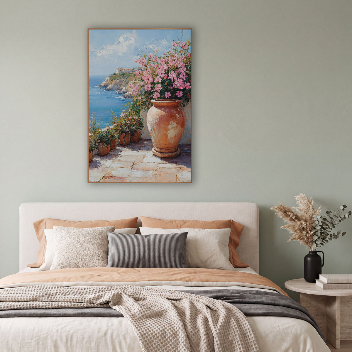 Cliffside Terrace Pink Blossom Coastal wall art in a bright coastal-style room – large terracotta urn with pink
