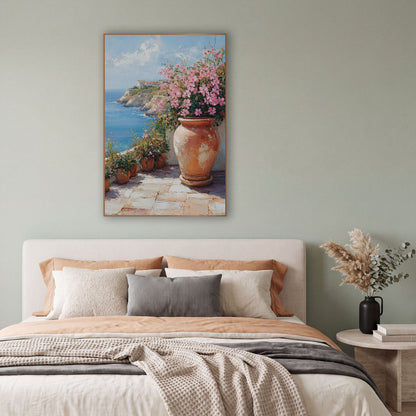 Cliffside Terrace Pink Blossom Coastal wall art in a bright coastal-style room – large terracotta urn with pink
