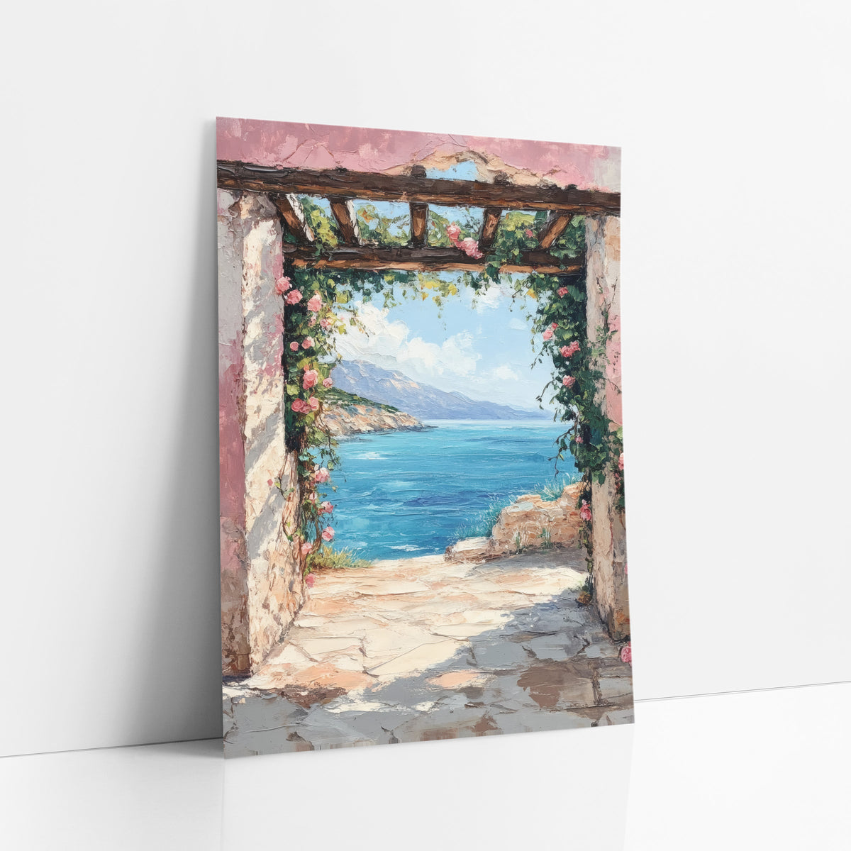 Rose Archway Coastal Sea View art print leaning against a white wall – pink-washed stone archway with climbing roses