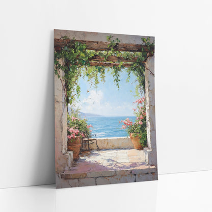 Vine Arch Terrace Sea View Coastal art print leaning against a white wall – stone archway with trailing green vines, pink