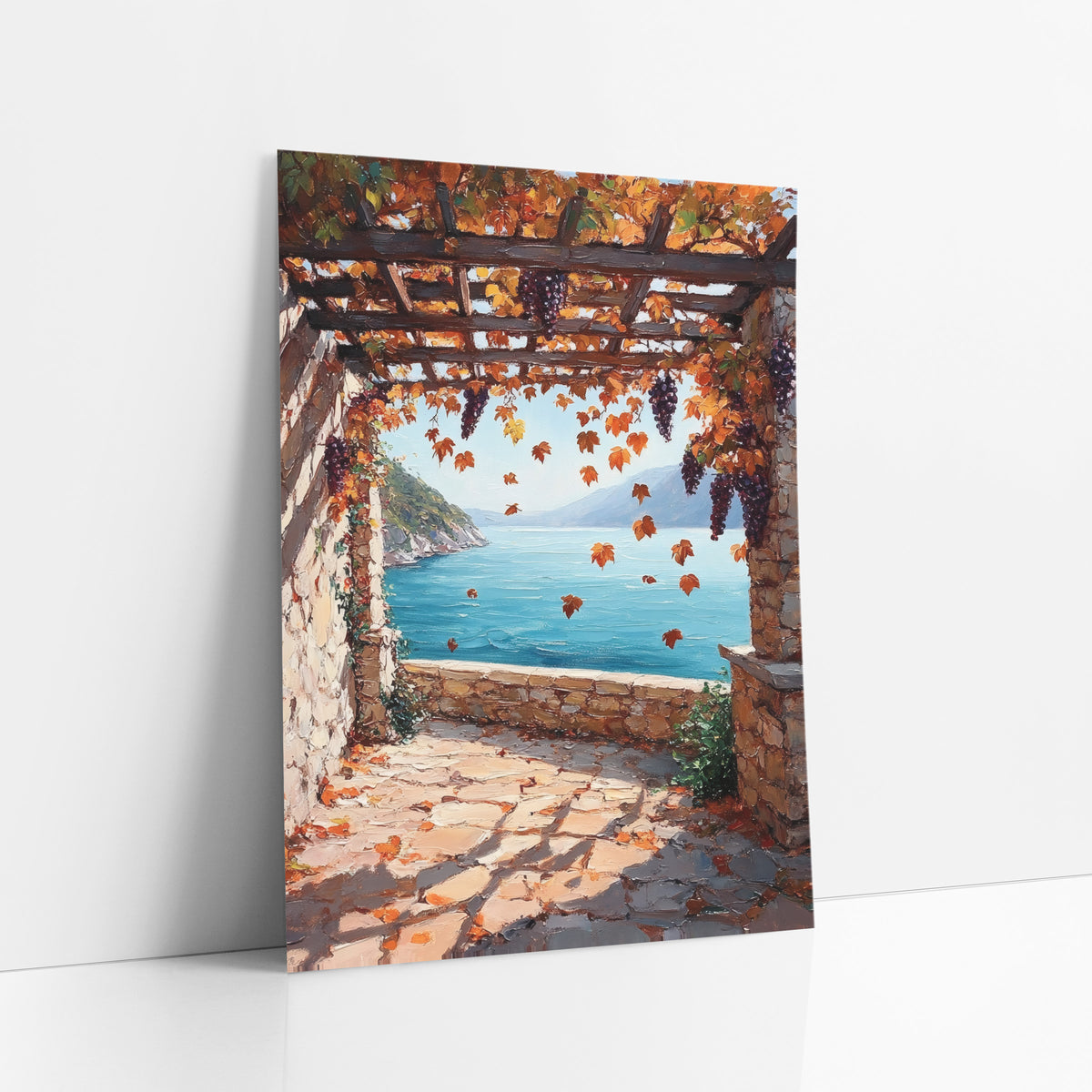 Autumn Grape Pergola Seaside Terrace art print leaning against a white wall – stone terrace under a wooden pergola