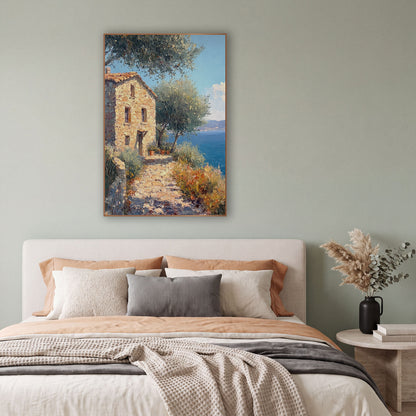 Olive Shaded Cobbled Path Cottage Coastal wall art in a bright coastal-style room – sunlit stone cottage with orange