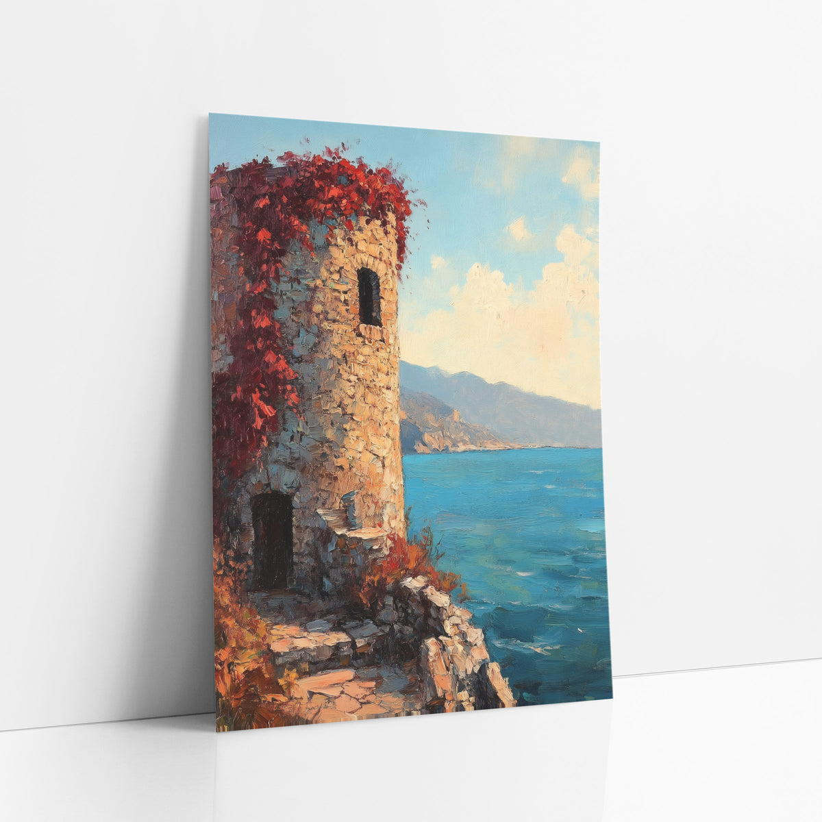 Red Vine Stone Tower Coastal art print leaning against a white wall – round stone tower with red vines on a rocky coast above