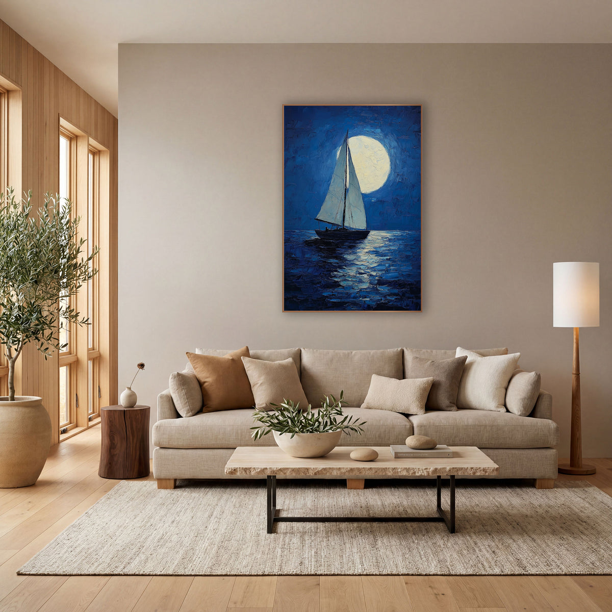 Lone Sloop Moonrise Coastal wall art in a bright coastal-style room – sailboat with two pale sails on dark blue water