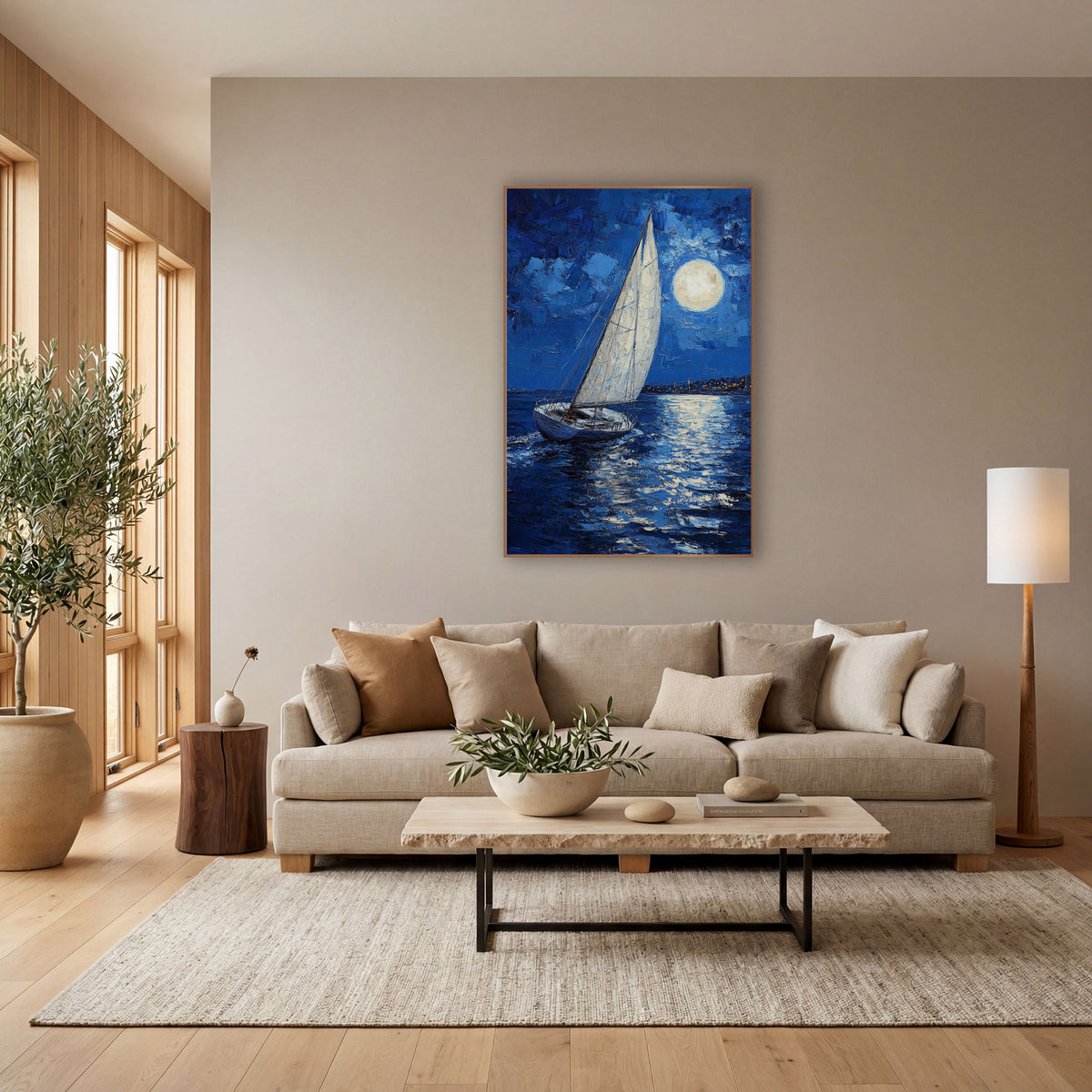 Moonlit Sailboat Cobalt Coastal Seascape wall art in a bright coastal-style room – white sailboat on dark blue water
