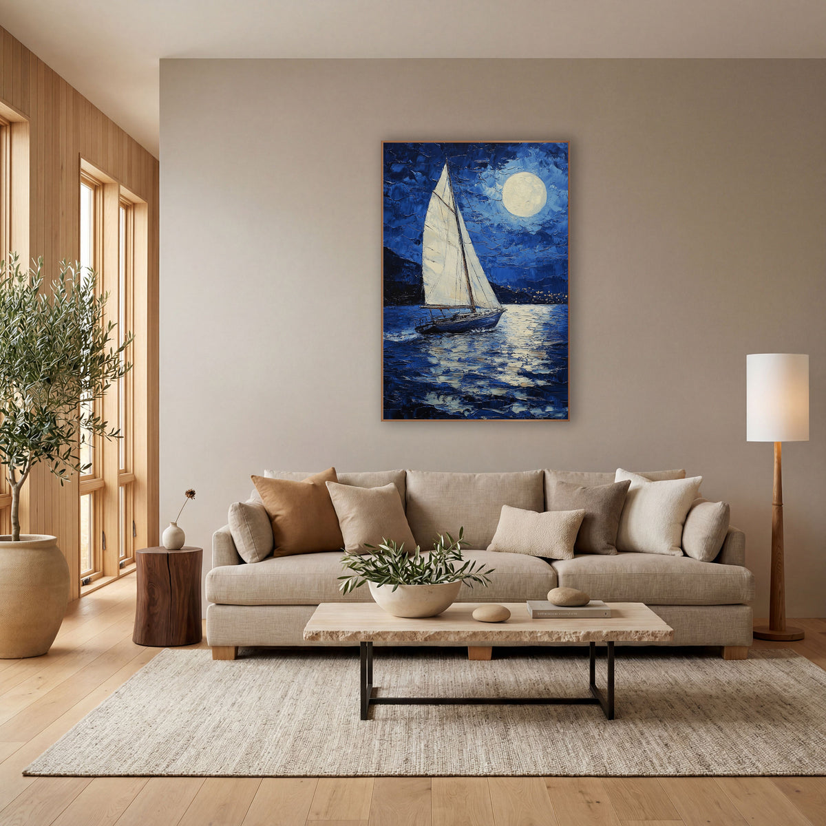 Moonlit Sailboat Deep Blue Coastal wall art in a bright coastal-style room – white sailboat on dark blue water