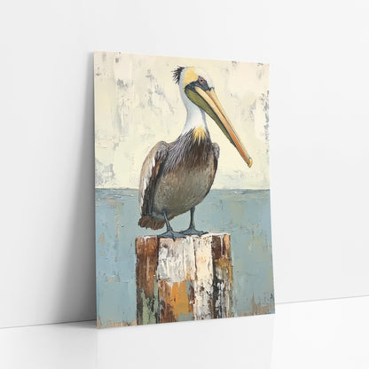 Standing Pelican Blue Horizon Coastal art print leaning against a white wall – brown pelican with long pale bill standing