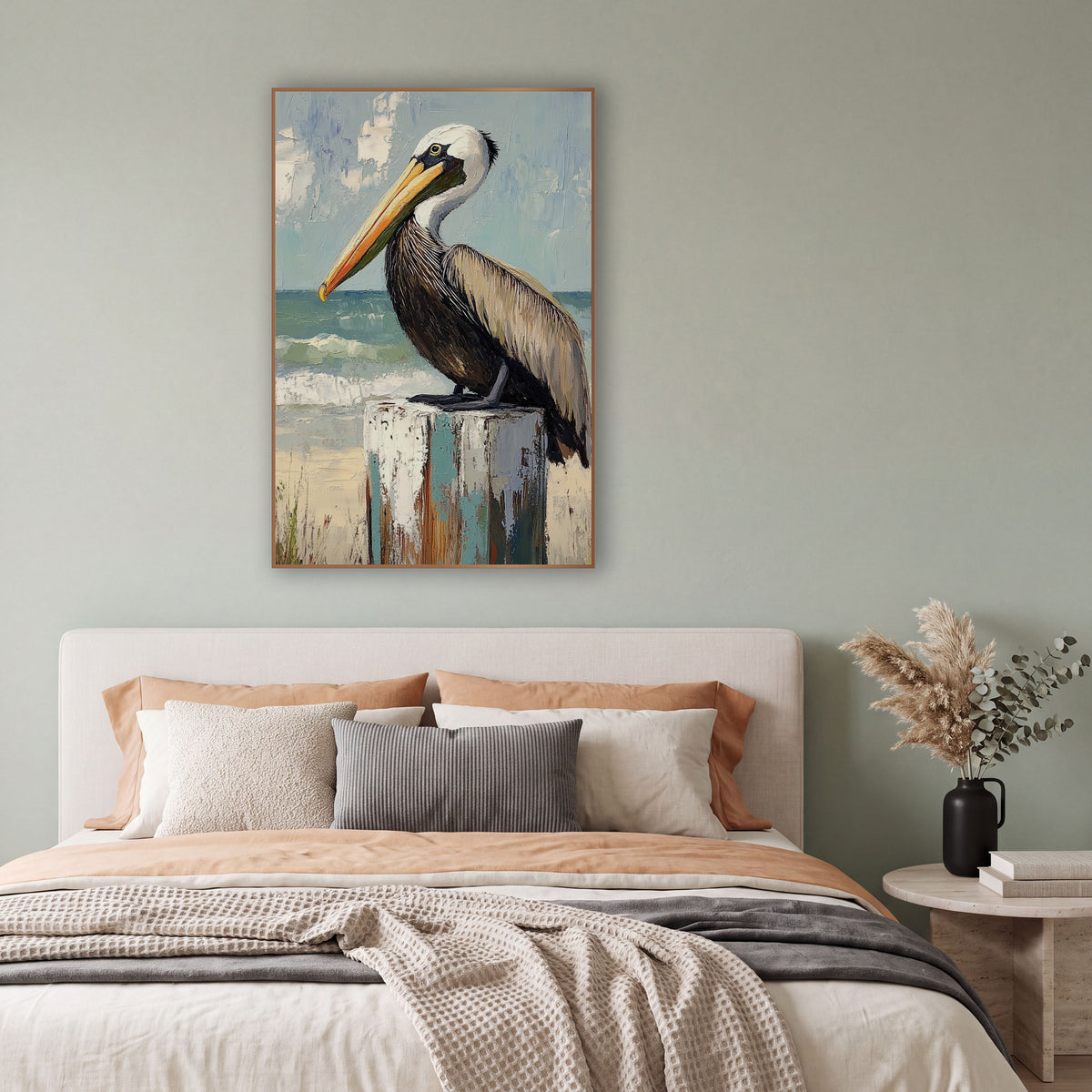 Pelican Overlooking Surf Beach Coastal wall art in a bright coastal-style room – brown pelican with orange bill