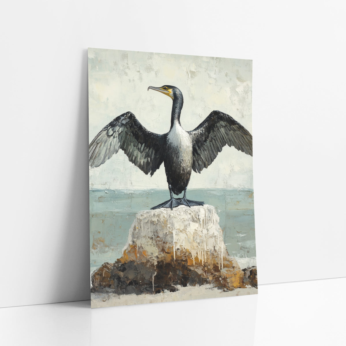 Cormorant Spread Wings Coastal Bird art print leaning against a white wall – black cormorant with spread wings and yellow