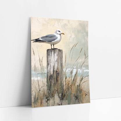 Gull Dune Shoreline Coastal art print leaning against a white wall – seagull perched on a weathered wooden post among tall