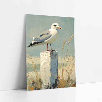 Orange Beaked Gull Wheat Coastal art print leaning against a white wall – white and gray seagull standing on a weathered