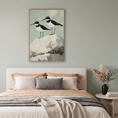Red Beak Oystercatchers Seafoam Coastal wall art in a bright coastal-style room – two black and white shorebirds