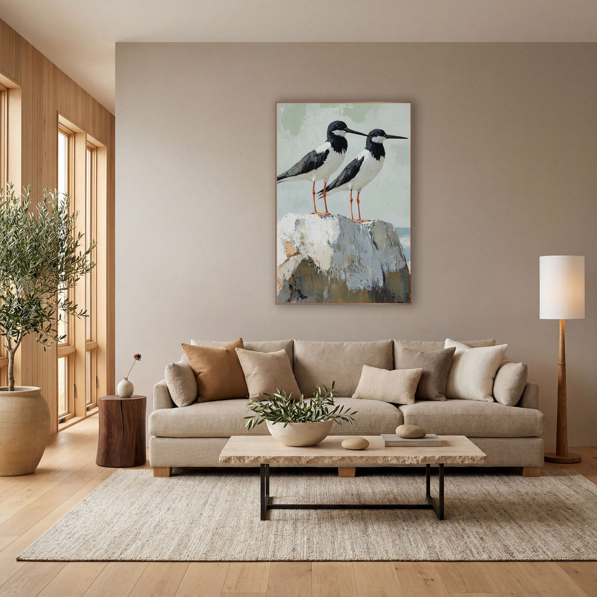 Black White Shorebird Pair Coastal wall art in a bright coastal-style room – two black and white shorebirds