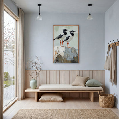 Black White Shorebird Pair Coastal wall art in a bright coastal-style room – two black and white shorebirds