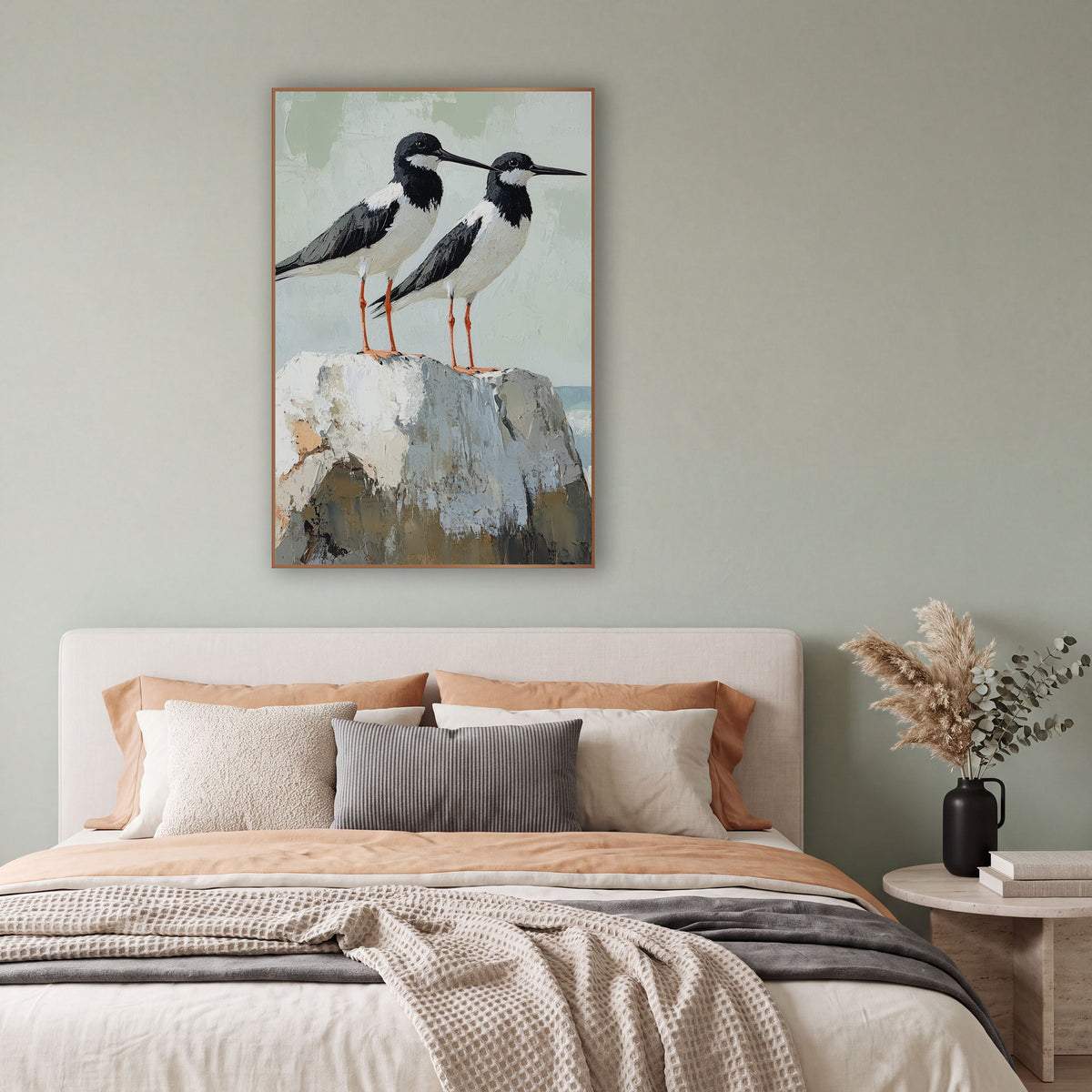 Black White Shorebird Pair Coastal wall art in a bright coastal-style room – two black and white shorebirds