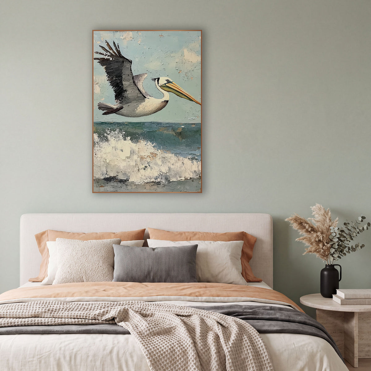 Pelican Wings Raised Coastal wall art in a bright coastal-style room – brown pelican with raised wing flying