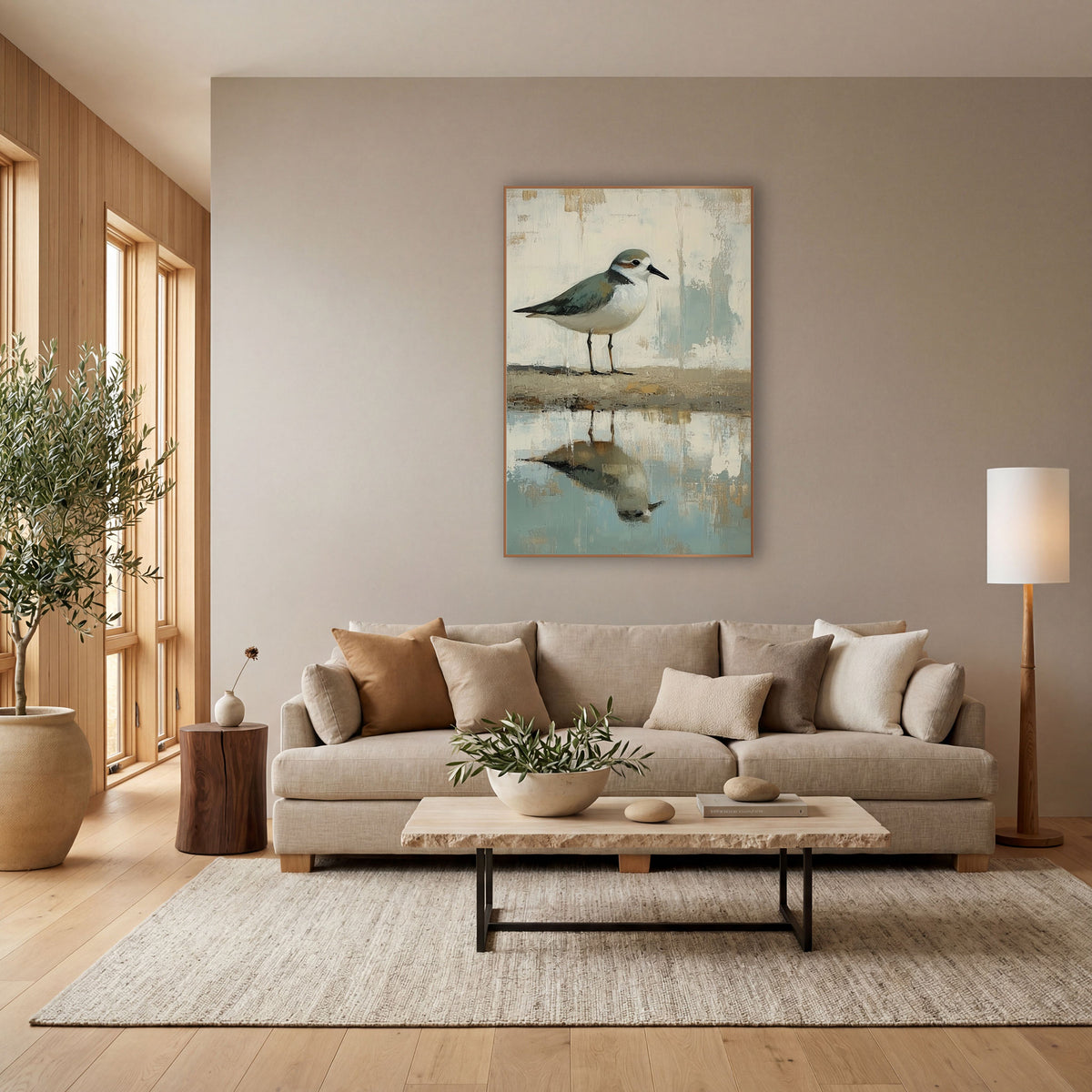 Plover Shoreline Reflection Coastal Neutral wall art in a bright coastal-style room – small plover with sage-gray back