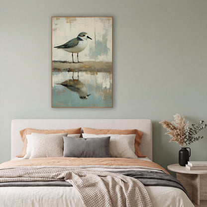 Plover Shoreline Reflection Coastal Neutral wall art in a bright coastal-style room – small plover with sage-gray back