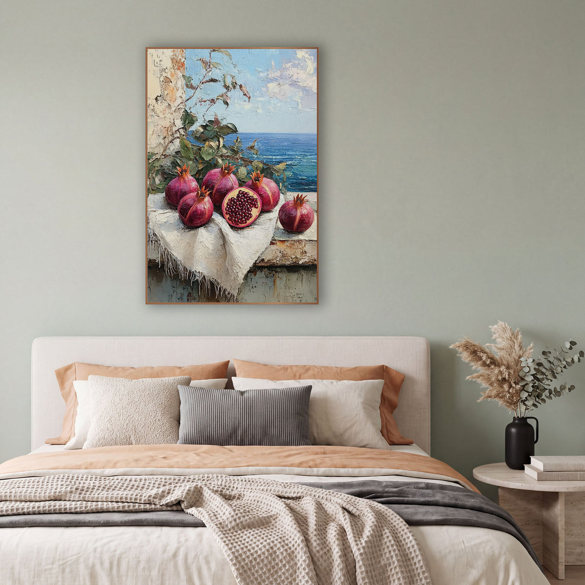 Halved Pomegranate Terrace Coastal wall art in a bright coastal-style room – still life of pomegranates, one cut open