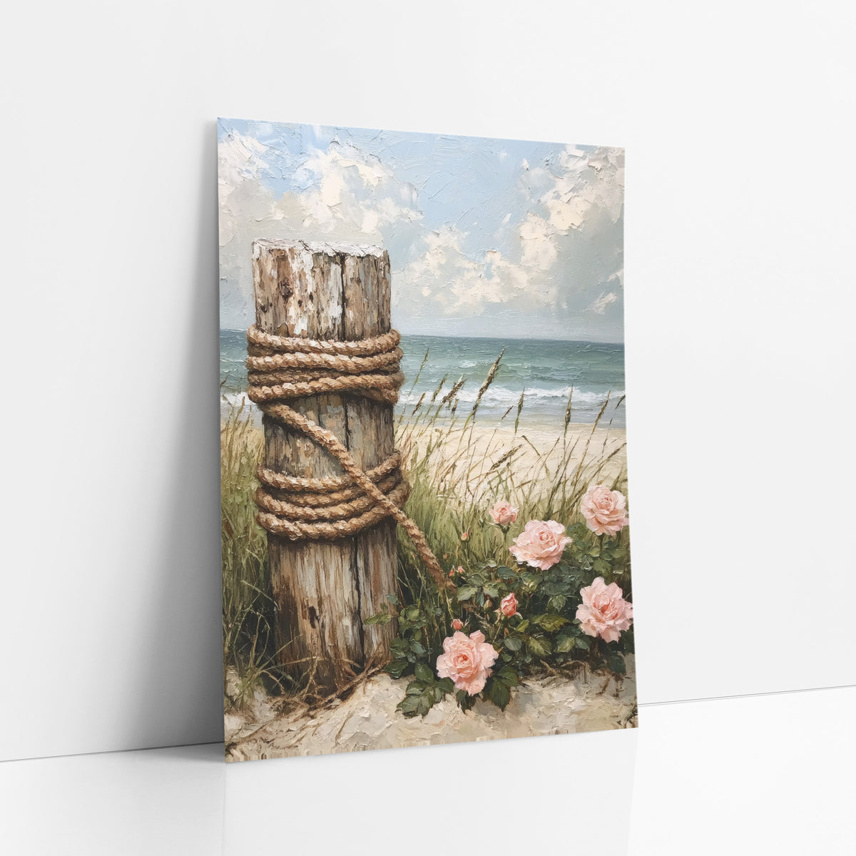 Rope Wrapped Post Beach Roses art print leaning against a white wall – weathered wooden post wrapped in thick rope