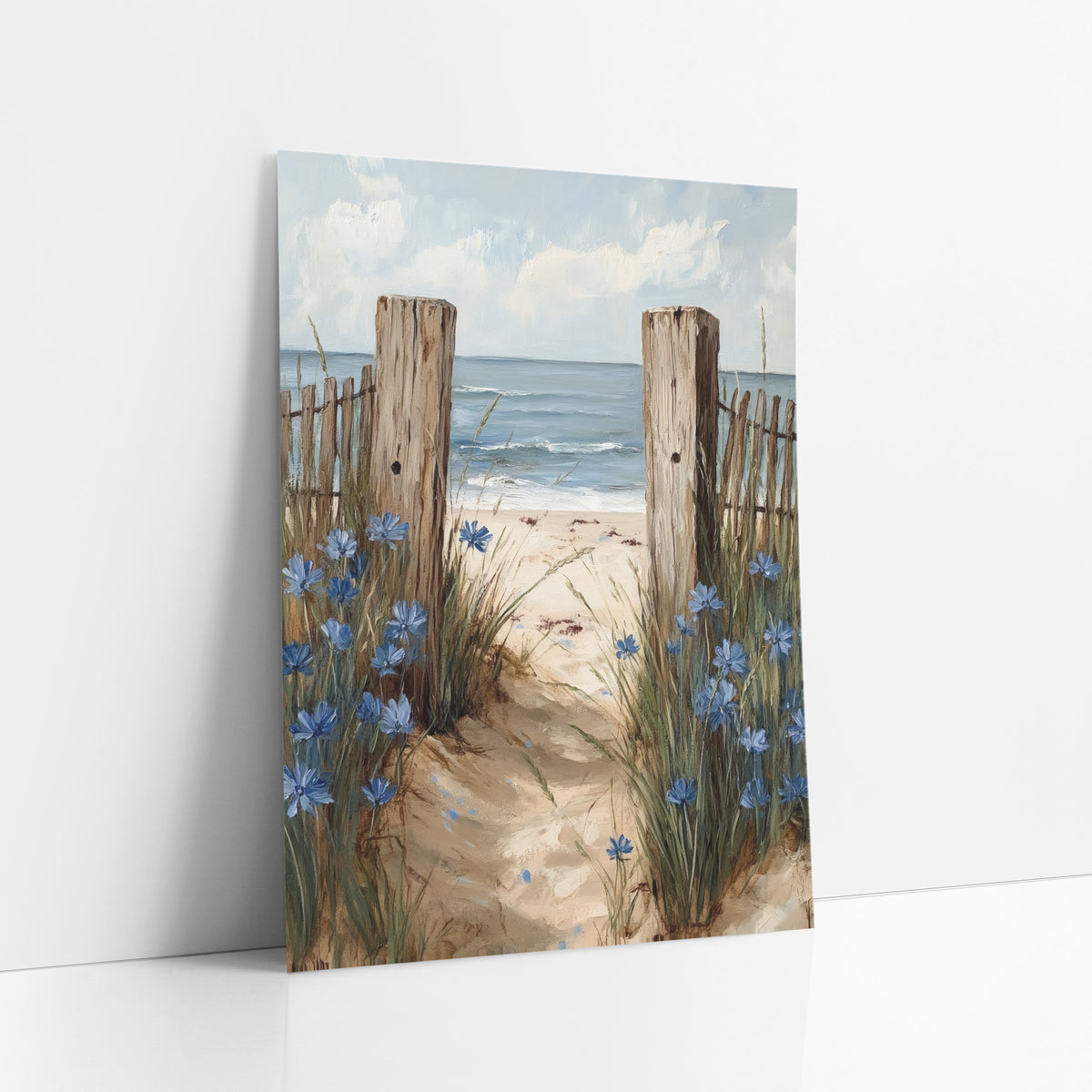 Blue Cornflower Beach Path Coastal art print leaning against a white wall – sandy beach path between two weathered wooden